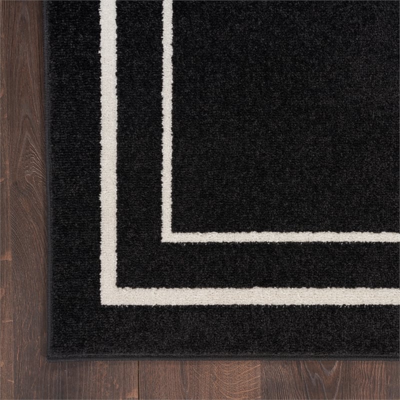 Nourison Essentials 10' x 14' Black Ivory Contemporary Indoor/Outdoor Rug
