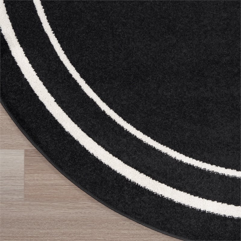 Nourison Essentials 4' x round Black Ivory Contemporary Indoor/Outdoor Rug