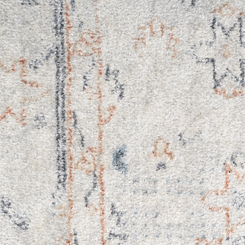 nourison home astra machine washable 9' x 12' light blue fabric area rug