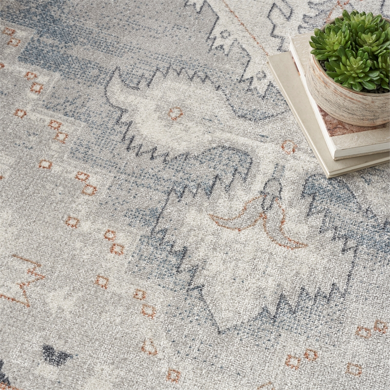 nourison home astra machine washable 9' x 12' light blue fabric area rug