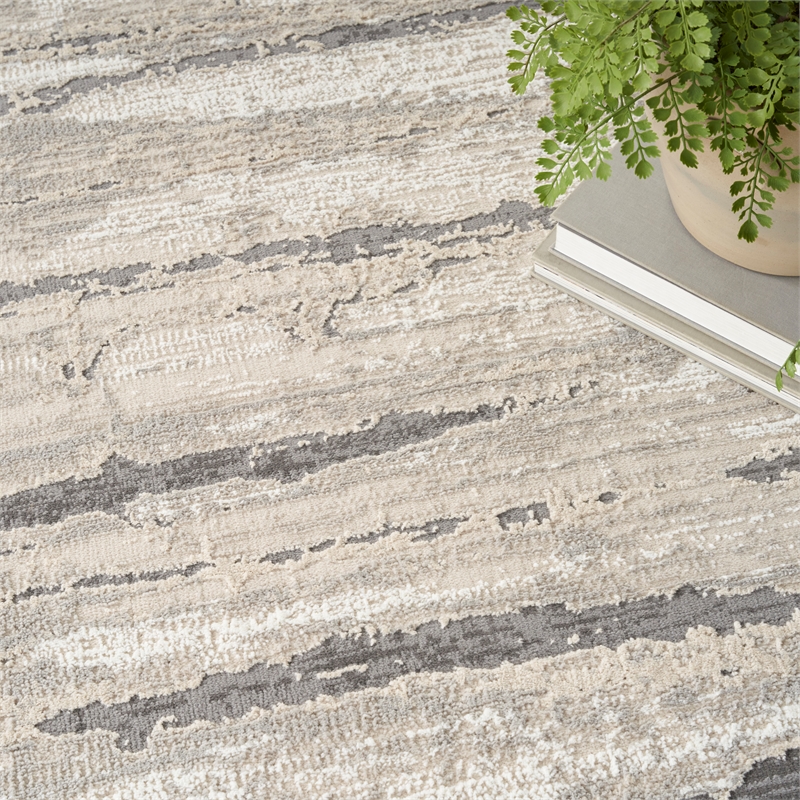 Nourison Home Eco-Friendly 9' x 12' Fabric Ivory Multicolor Area Rug