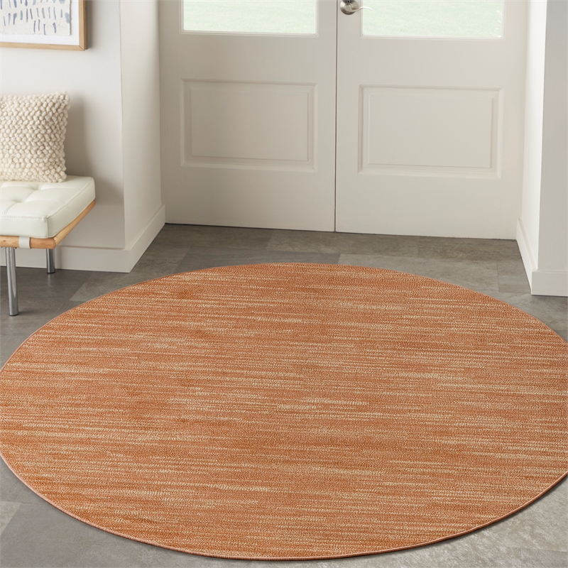 Nourison Essentials 4' x Round Rust Fabric Area Rug