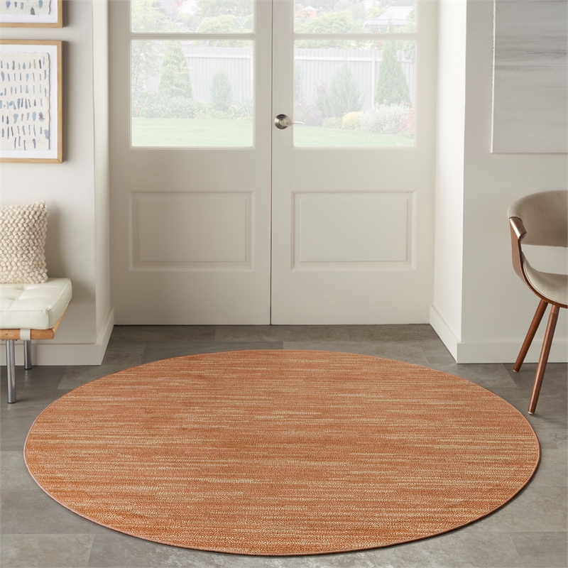 Nourison Essentials 4' x Round Rust Fabric Area Rug