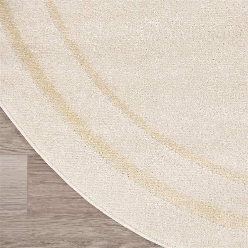 Nourison Essentials 4' x Round Ivory Gold Fabric Area Rug