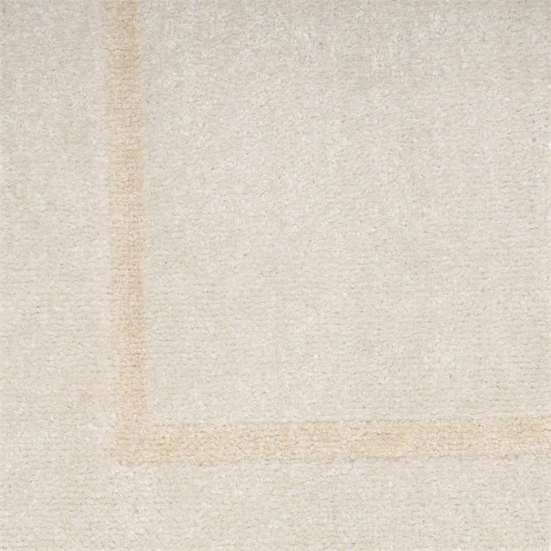 Nourison Essentials 4' x Round Ivory Gold Fabric Area Rug