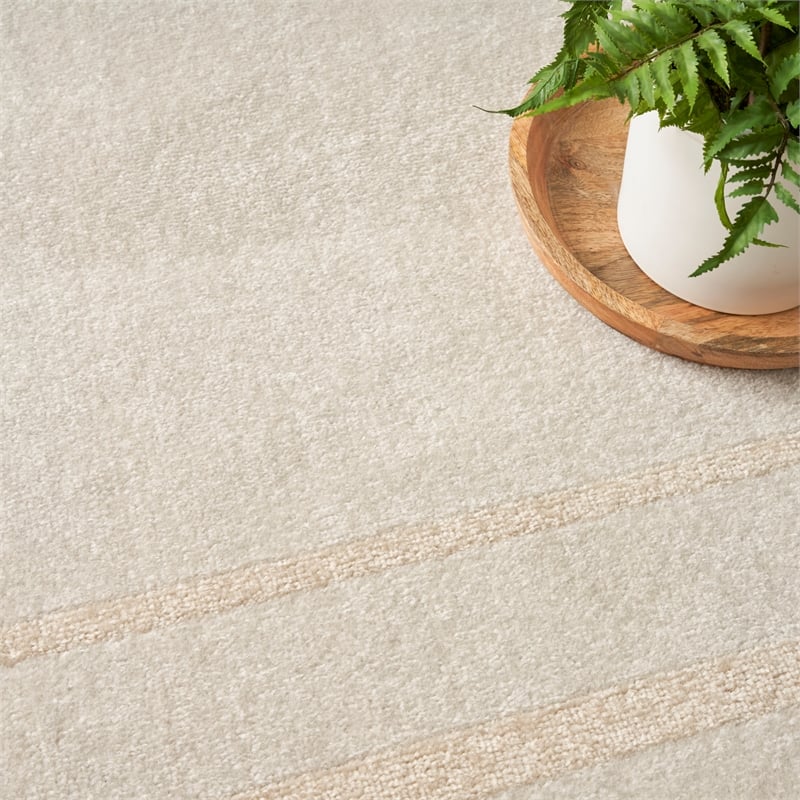 Nourison Essentials 4' x Round Ivory Gold Fabric Area Rug