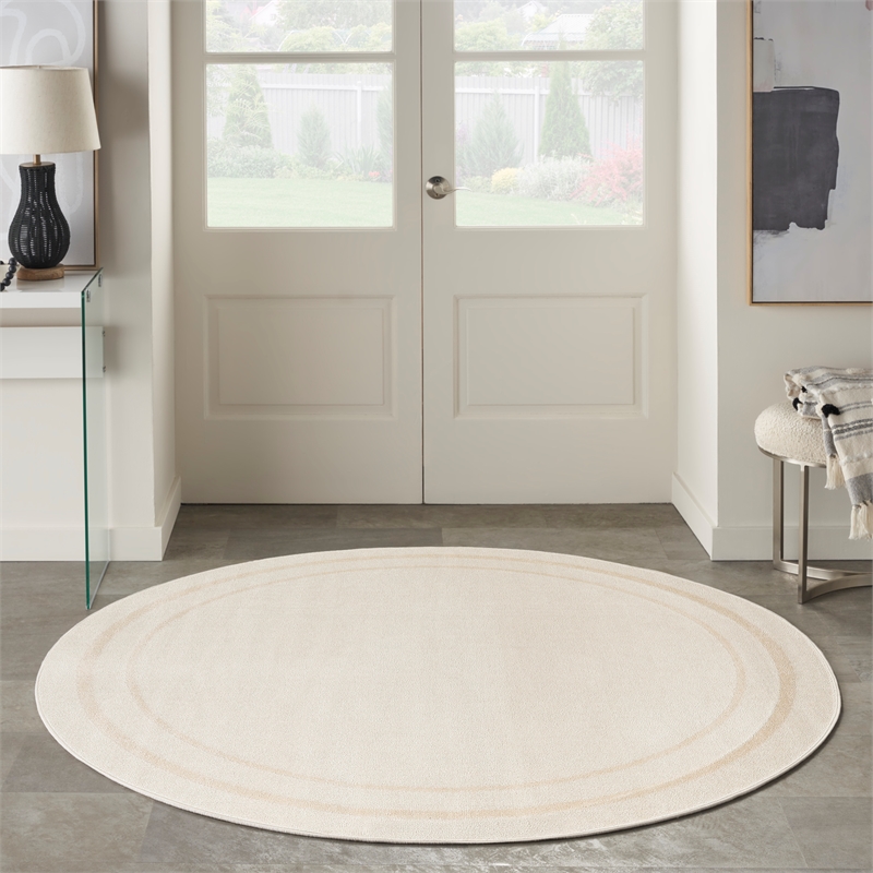 Nourison Essentials 4' x Round Ivory Gold Fabric Area Rug