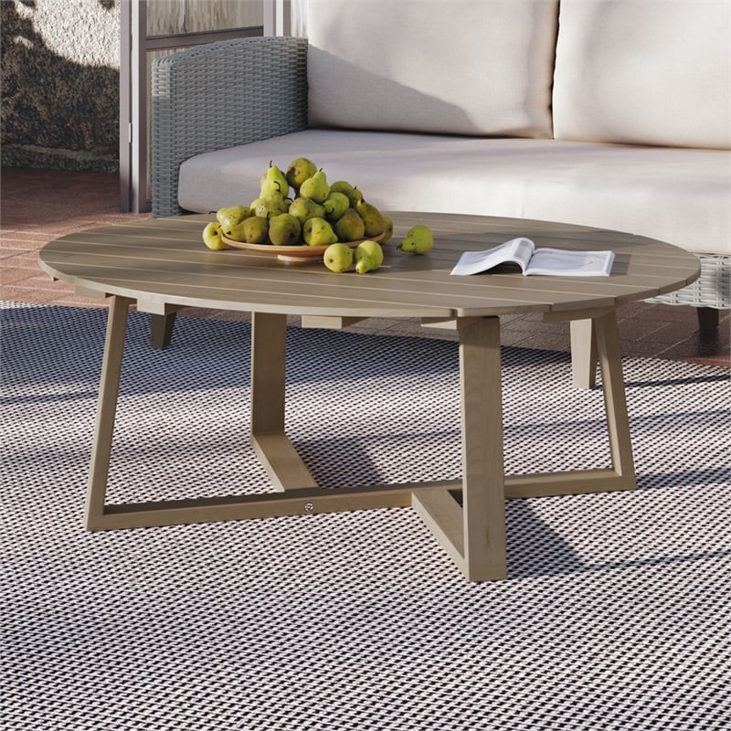 New Classic Furniture Carezza Oval Wood/Wicker Patio Coffee Table in Natural
