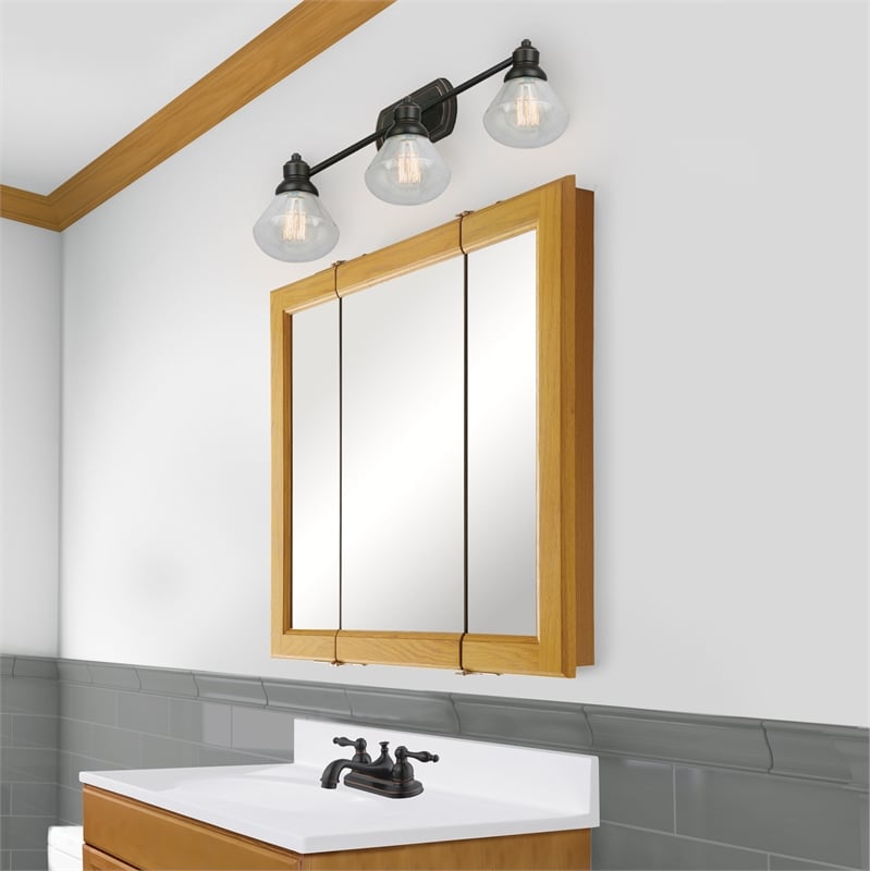 Claremont Assembled Medicine Wood Cabinet in Honey Oak 24-Inch