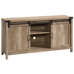 sauder bridge acre engineered wood tv stand with sliding doors for tvs up to 65