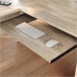 Sauder Hammond Engineered Wood L-Shaped Desk in Chalk Oak Finish