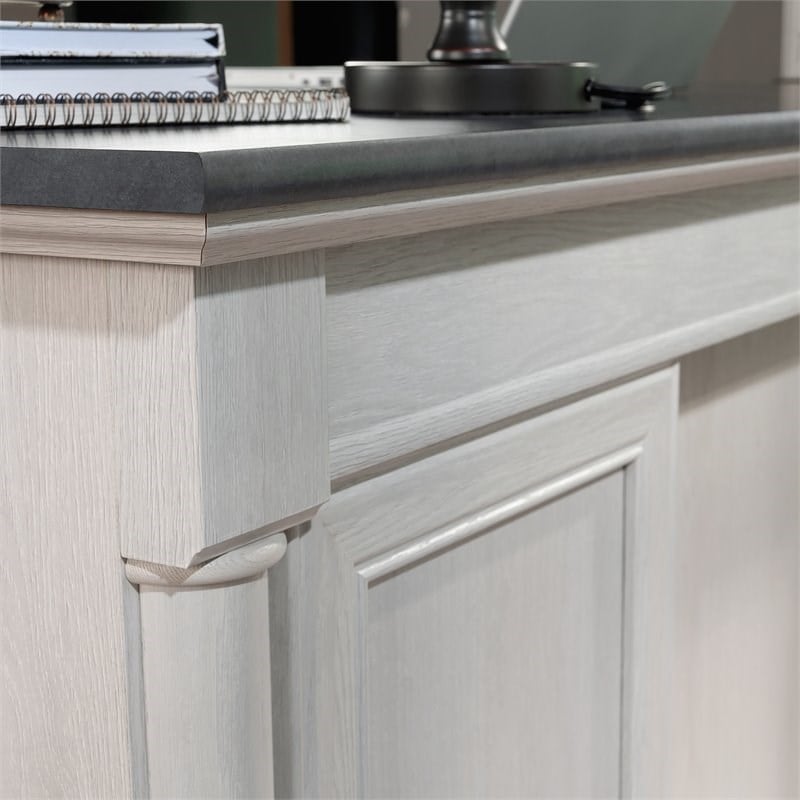 Sauder Palladia Engineered Wood Executive Desk in Glacier Oak/Rosso Slate Accent