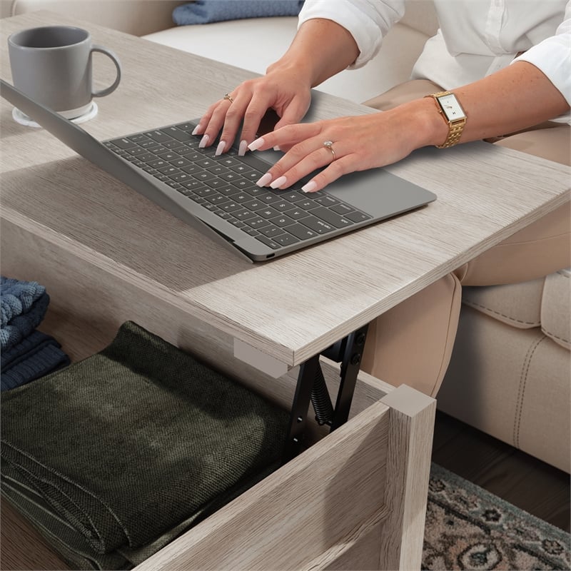 Sauder East Adara Engineered Wood Lift Top Coffee Table in Cascade Oak Finish