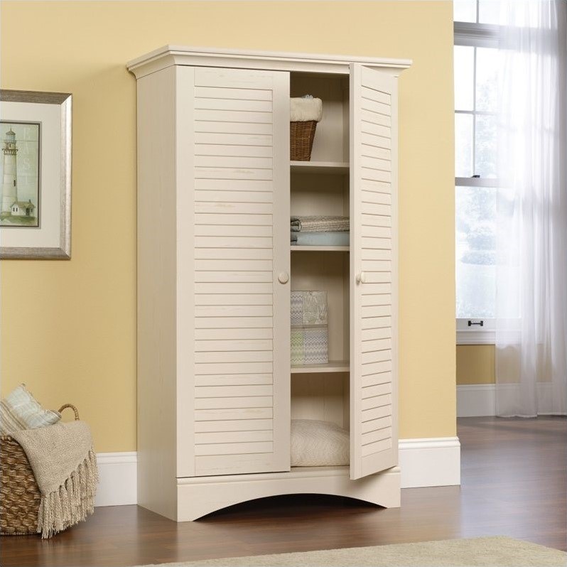 Sauder Harbor View Storage Cabinet In, Sauder Harbor View Library Bookcase With Doors Antiqued White Finish