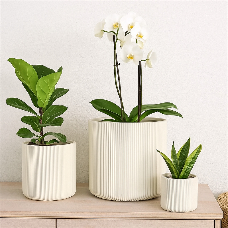 Benjara Elly Round Planter Set of 3- Vertical White Resin 18- 13- 9 Inch