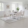 Benjara Zenie 9pc Dining Set- Classy White Wood Table- 8 Chairs- Faux Leather