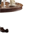 Benjara Wooden Round Dining Table With Pedestal Feet- Cherry Brown