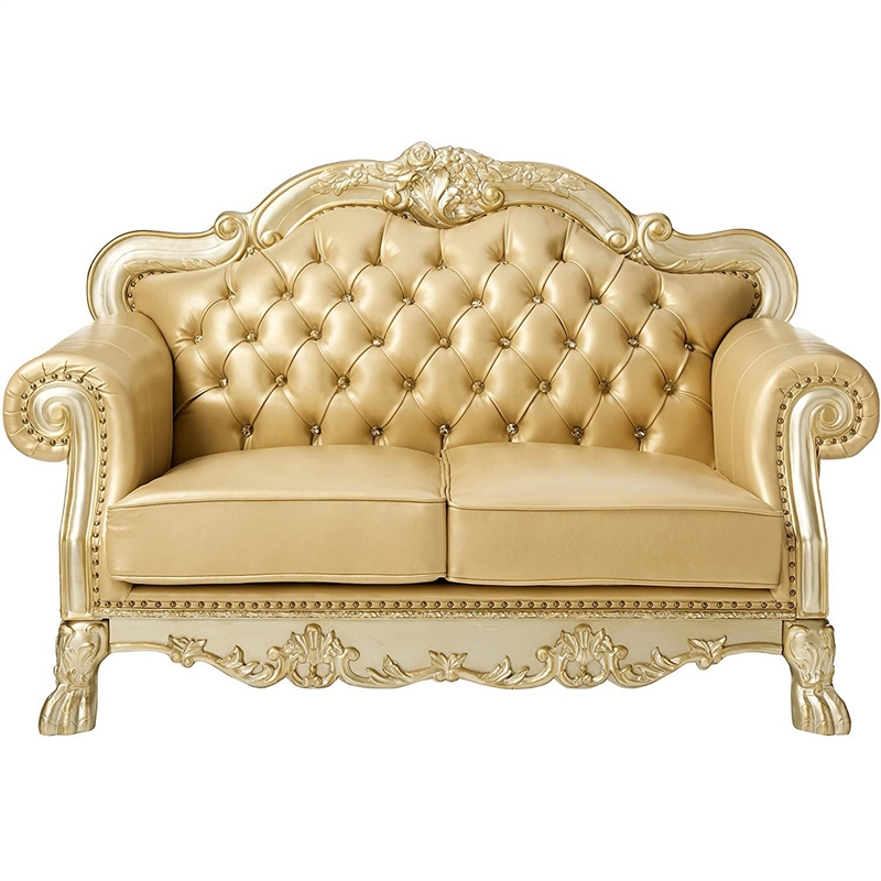 Benjara Traditional Button Tufted Leatherette Loveseat with Carved Details- Gold