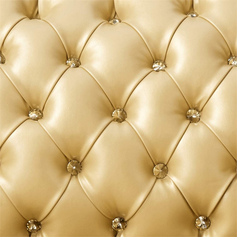 Benjara Traditional Button Tufted Leatherette Loveseat with Carved Details- Gold