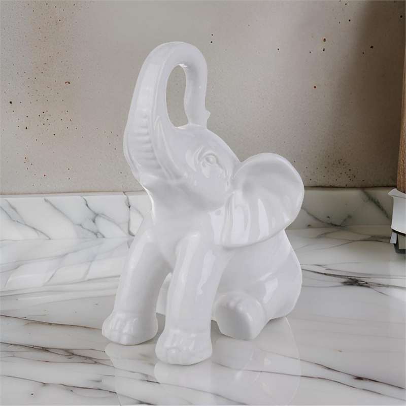 Benjara Ceramic Baby Elephant Figurine with Raised Trunk- White