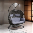 Benjara Patio Swing Chair with Tubular Stand and Wicker Weaving- Black