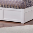 Madison Queen Wood Platform Bed with Footboard and Twin XL Trundle in White