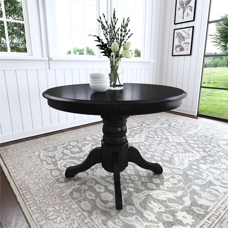 Black round pedestal dining table hotsell