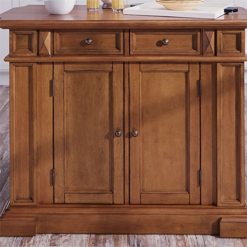 Homestyles Americana Wood Kitchen Island in Brown