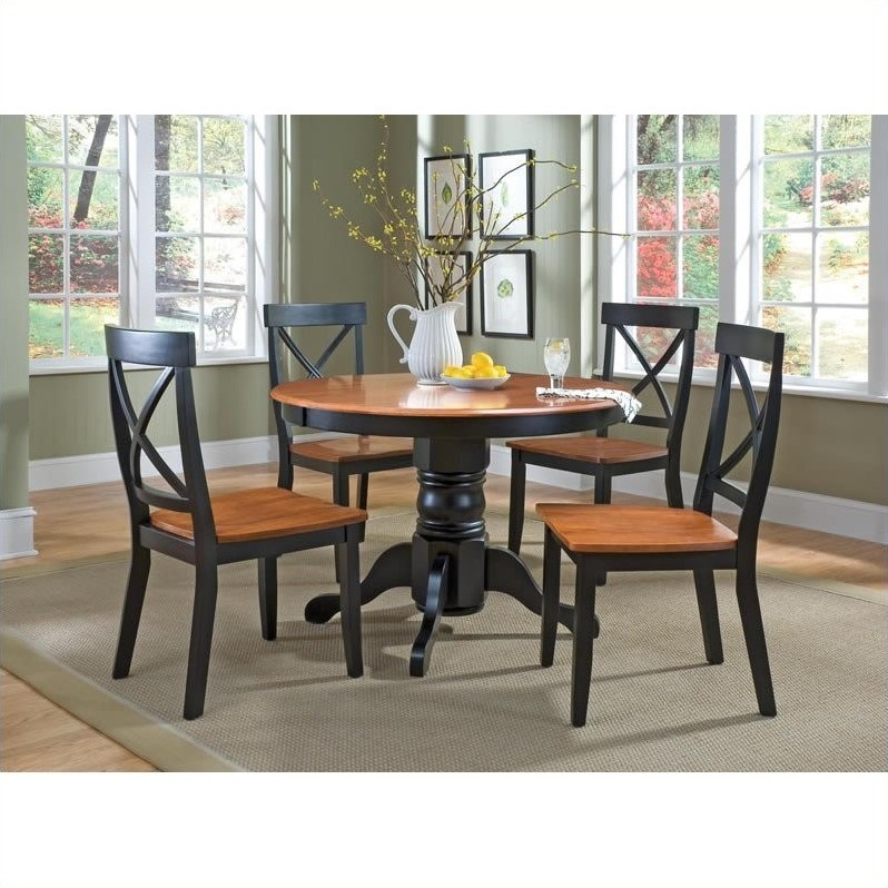 round pedestal casual dining table in black and cottage
