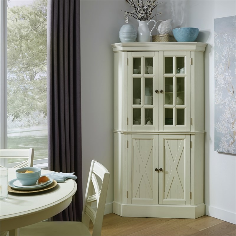 Homestyles Seaside Lodge Wood Corner China Cabinet in Off White