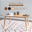 Linon Patty Mid Century Dining Table with Tapered Legs in Natural Brown Wood