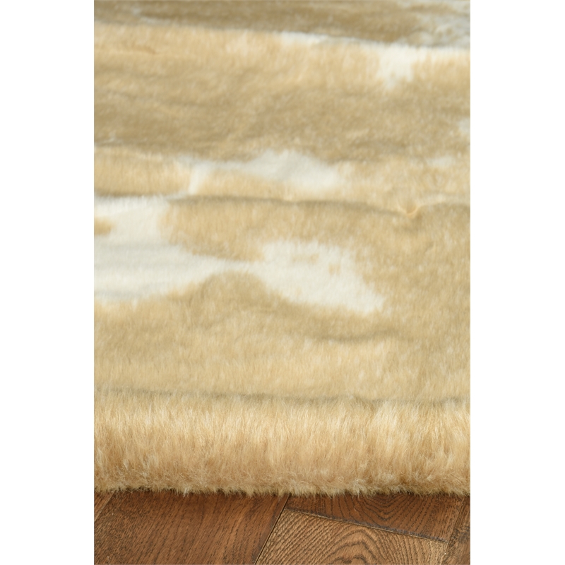 Linon Faux Hide Polyester Mini Cowhide Accent Rug in Caramel and Cream