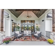 Linon Indoor Outdoor Machine Washable Luna Area 7'x9' Rug in Orange and Cream