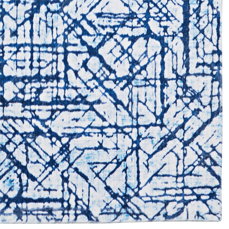 Linon Motif Printed Faux Rabbit Ingrain Polyester 8'x10' Area Rug in Blue