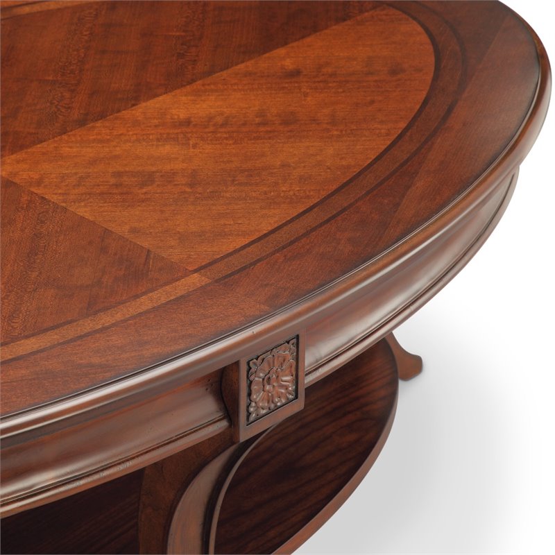 Magnussen Winslet Oval Wood Coffee Table with Casters in Cherry