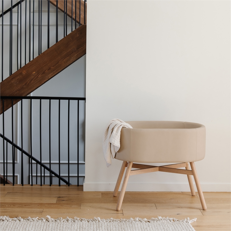 babyletto x GATHRE Bonded Vegan Leather Capsule Shaped Bassinet in Millet