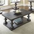 Dory Coffee Table in Ebony Finish with planked top and pedestal base