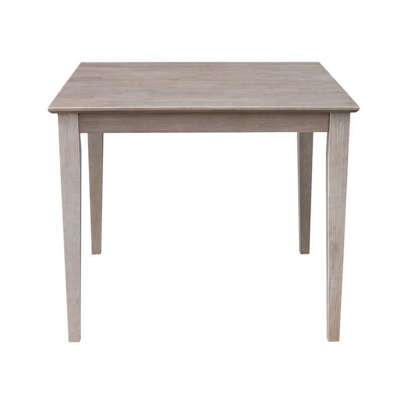 International Concepts Solid Wood Top Table - Dining Height in Washed Gray Taupe