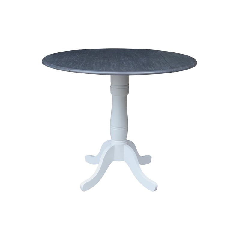 International Concepts 42 In Round dual drop Leaf Pedestal Table 35.5 