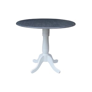 International Concepts 42 In Round dual drop Leaf Pedestal Table 35.5 &quotH