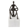 Uttermost Sit Back Relax And Read Iron Sculpture in Brown