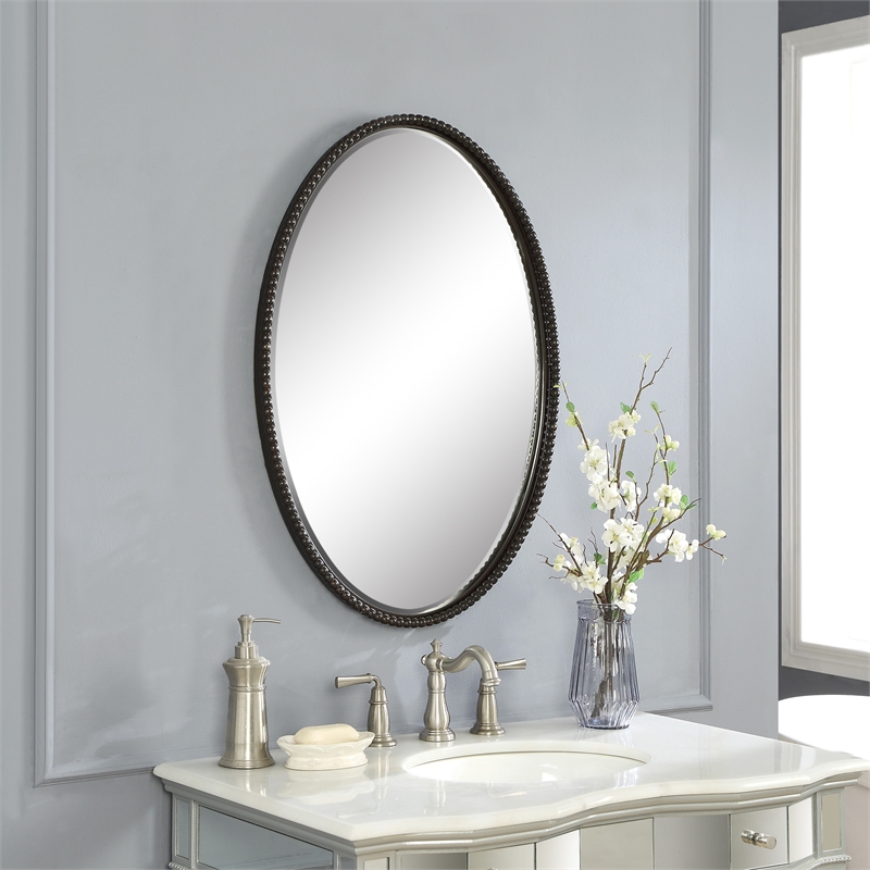 Uttermost Sherise Oval Metal and Glass Wall Mirror in Light Distressed Bronze