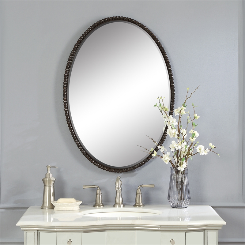 Uttermost Sherise Oval Metal and Glass Wall Mirror in Light Distressed Bronze