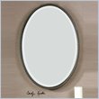 Uttermost Sherise Oval Metal and Glass Wall Mirror in Light Distressed Bronze
