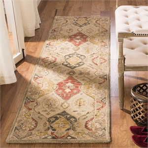 Safavieh Antiquity 4' X 6' Hand Tufted Wool Rug in Beige
