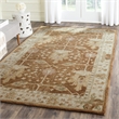 Safavieh Antiquity 5' X 8' Hand Tufted Wool Rug in Brown and Beige