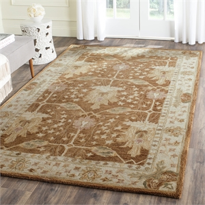 Safavieh Antiquity 6' X 9' Hand Tufted Wool Rug in Brown and Beige