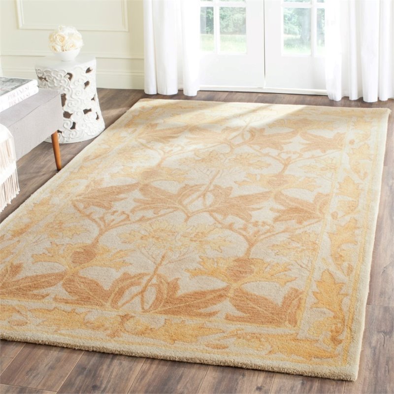 Safavieh Antiquity 4' X 6' Hand Tufted Wool Rug in Beige and Gold