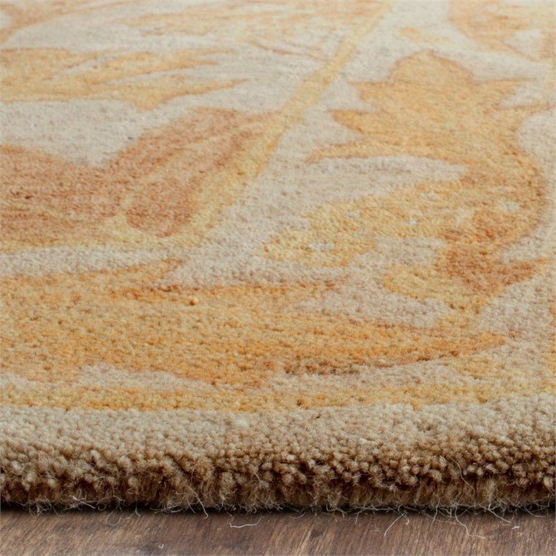 Safavieh Antiquity 4' X 6' Hand Tufted Wool Rug in Beige and Gold