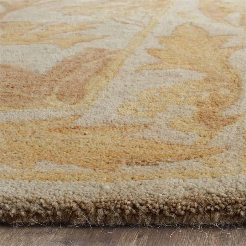 Safavieh Antiquity 5' X 8' Hand Tufted Wool Rug in Beige and Gold